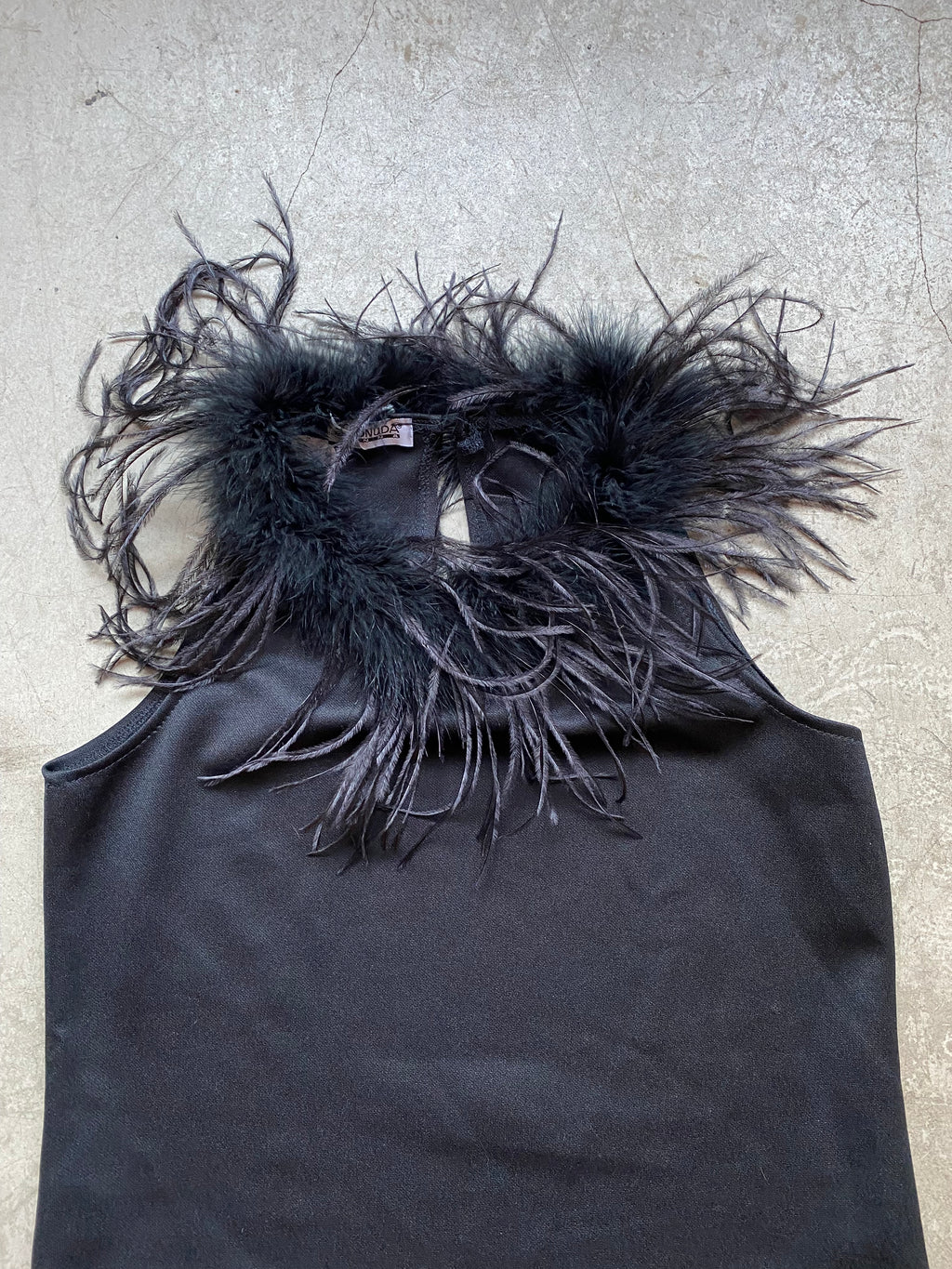 Black tank top with faux feather trim