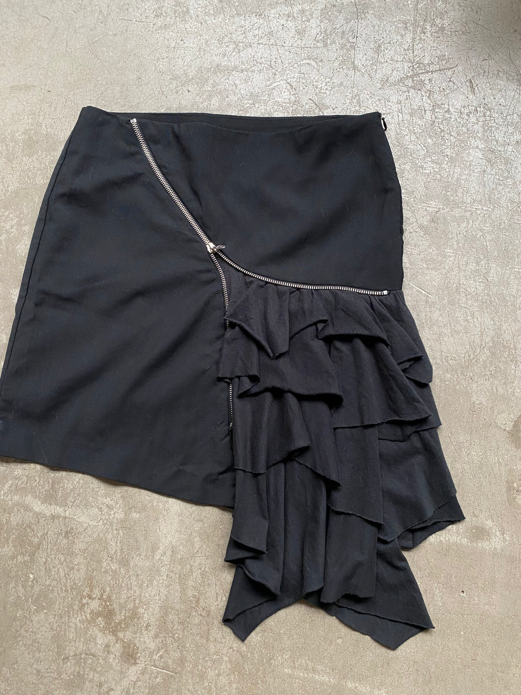 Black asymmetrical ruffle mini skirt